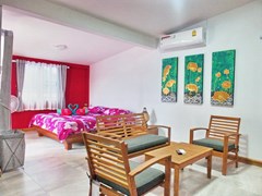 House for sale South Pattaya showing the master bedroom with lounge area