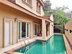 House For sale East Pattaya showing the house, terrace, pool and sala