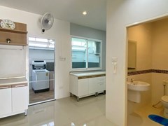 House for sale East Pattaya showing the kitchen and guest bathroom 