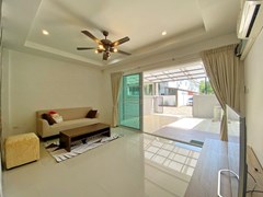 House for sale East Pattaya showing the living area and carport 
