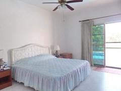 House for sale East Pattaya showing the master bedroom with pool view