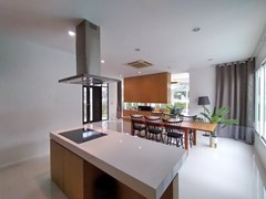 House for sale Pattaya showing the kitchen, dining and living areas  