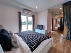 House for sale Pattaya showing the master bedroom and balcony 