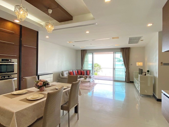 Condominium for rent Naklua Ananya showing the dining, living areas and balcony 