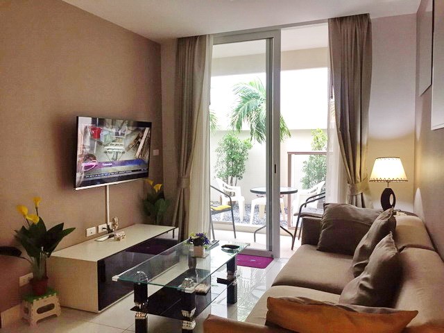 Condominium for rent on Pratumnak Hill Pattaya showing the living room and terrace 