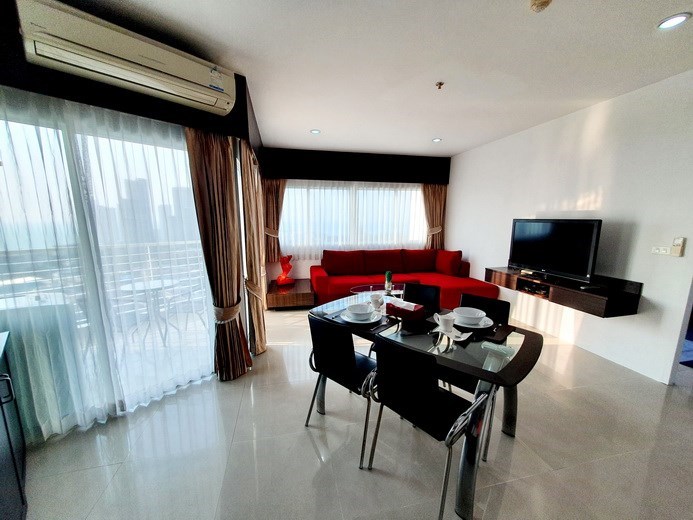 Condominium for rent Wong Amat Pattaya showing the living, dining and balcony 