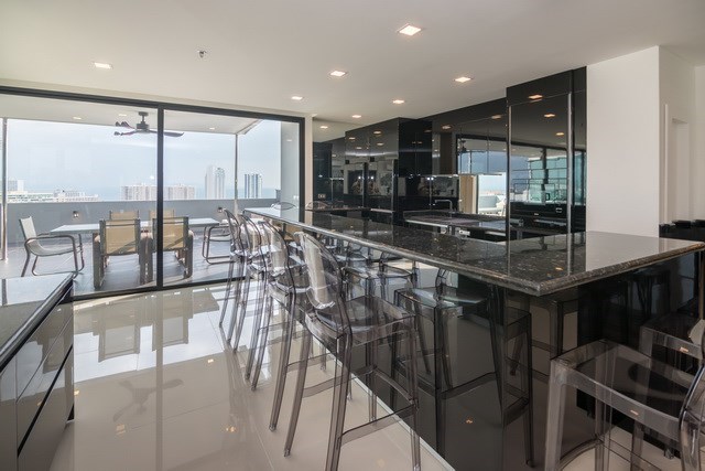 Condominium for sale Pratumnak Pattaya showing the dining, kitchen and balcony