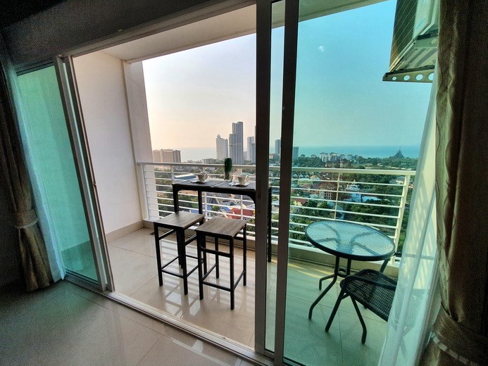 Condominium for sale Wong Amat Pattaya showing the bedroom balcony 
