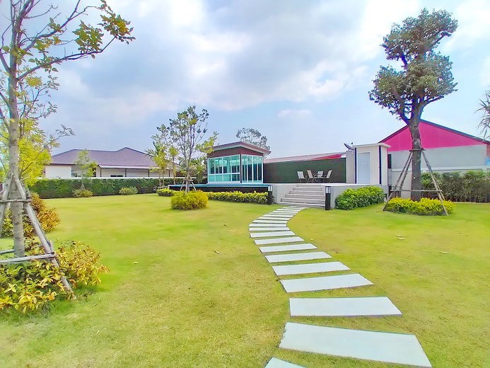 House for sale Huay Yai Pattaya showing the communal pool and park House for sale Huay Yai Pattaya showing the communal pool and park
