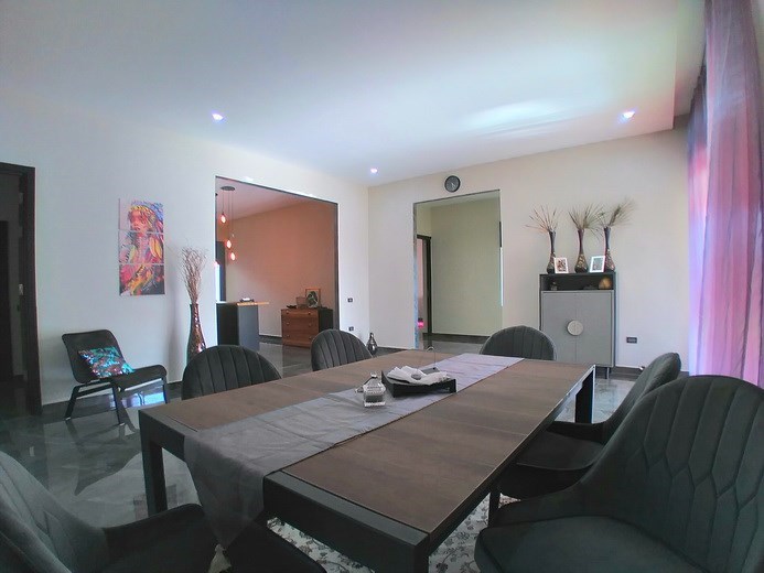 House for sale Huay Yai Pattaya showing the dining and kitchen areas House for sale Huay Yai Pattaya showing the dining and kitchen areas