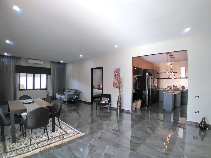 House for sale Huay Yai Pattaya showing the living, dining and kitchen areas House for sale Huay Yai Pattaya showing the living, dining and kitchen areas