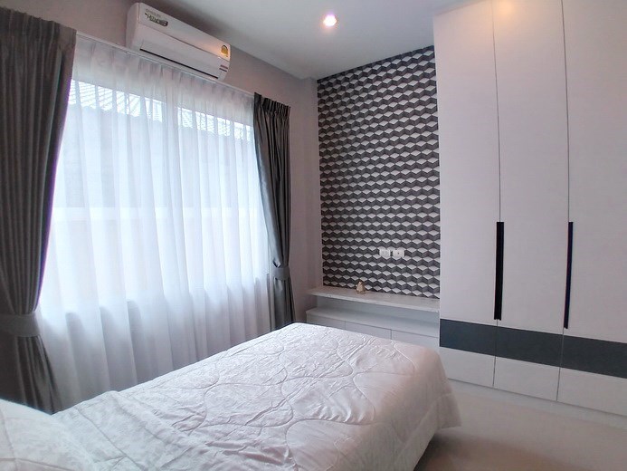 House for sale Huay Yai Pattaya showing the third bedroom  with wardrobes 