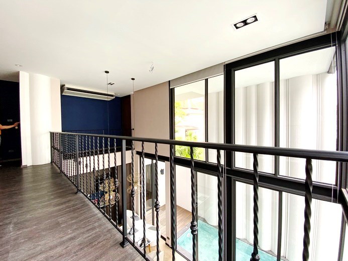 House for sale Jomtien showing the corridor to 3rd and 4th bedrooms
