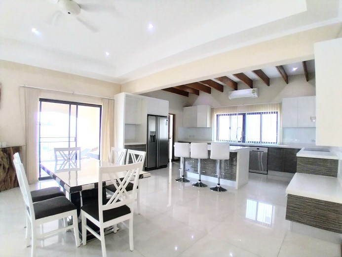 House for sale Mabprachan Pattaya showing the dining and kitchen areas 