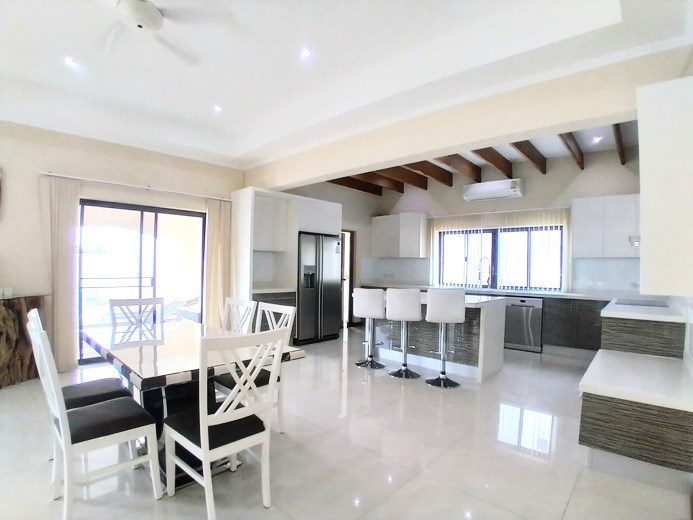 House for sale Mabprachan Pattaya showing the dining and kitchen areas House for sale Mabprachan Pattaya showing the dining and kitchen areas