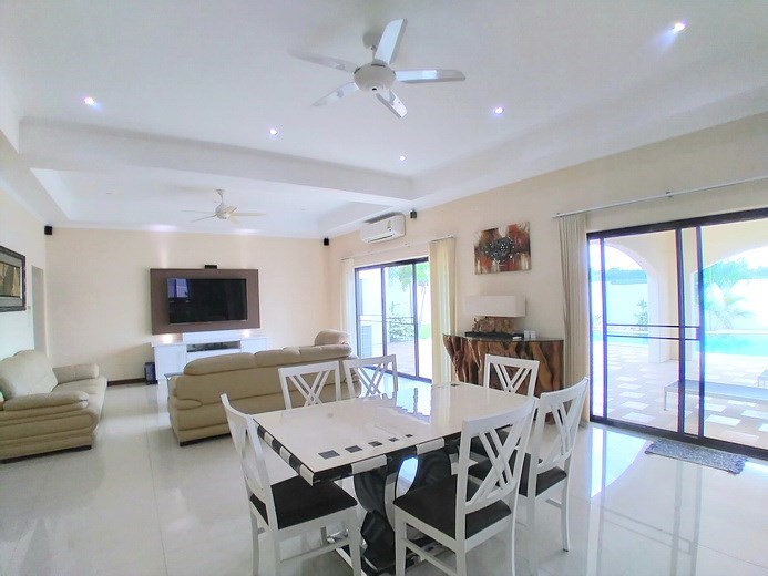 House for sale Mabprachan Pattaya showing the dining and living areas  