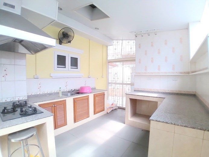 House for sale Mabprachan Pattaya showing the outside Thai kitchen 