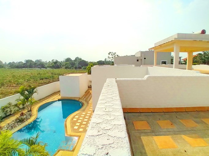 House for sale Mabprachan Pattaya showing the rooftop terrace with pool view House for sale Mabprachan Pattaya showing the rooftop terrace with pool view
