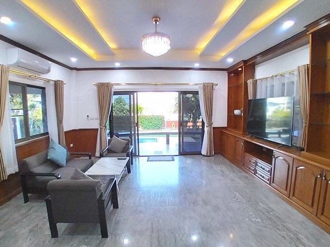 House for sale Pattaya showing the living area pool view House for sale Pattaya showing the living area pool view