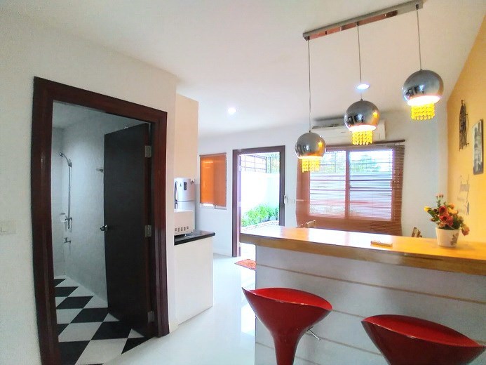 House for sale Pattaya showing the breakfast bar and guest bathroom 