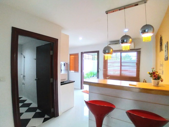House for sale Pattaya showing the breakfast bar and guest bathroom 