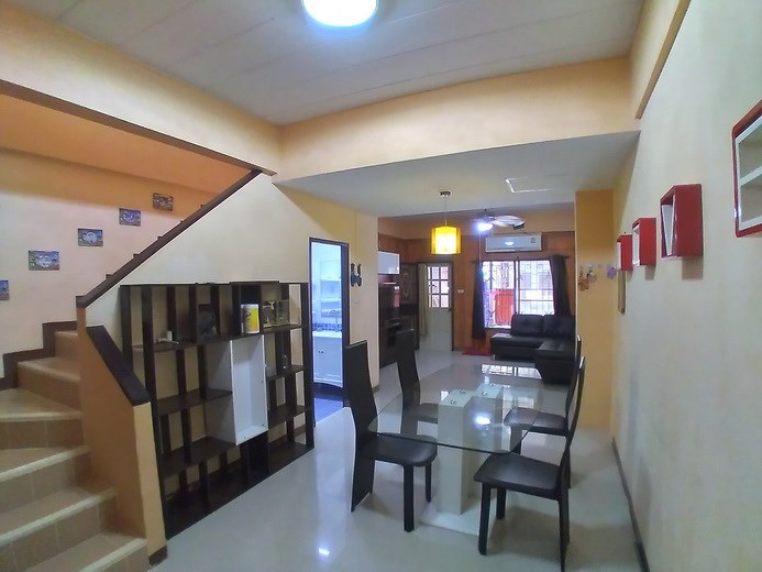 House for sale Pattaya showing the dining area and staircase House for sale Pattaya showing the dining area and staircase
