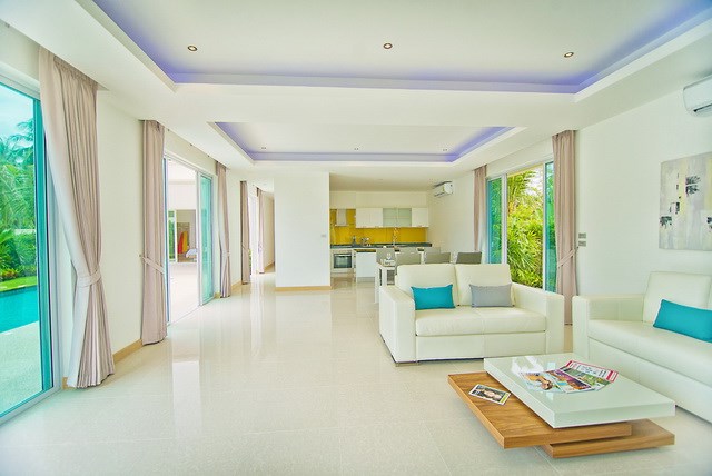 House For Sale Pattaya The Vineyard III showing the living area and swimming pool CONCEPT PHOTO