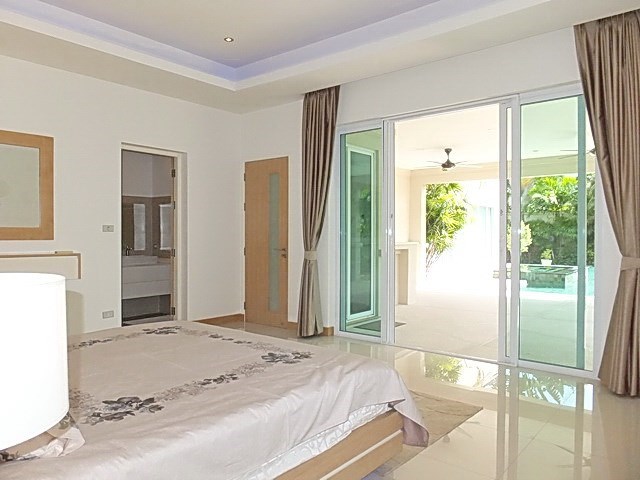 House for Sale at The Vineyard Pattaya showing the master bedroom pool view 