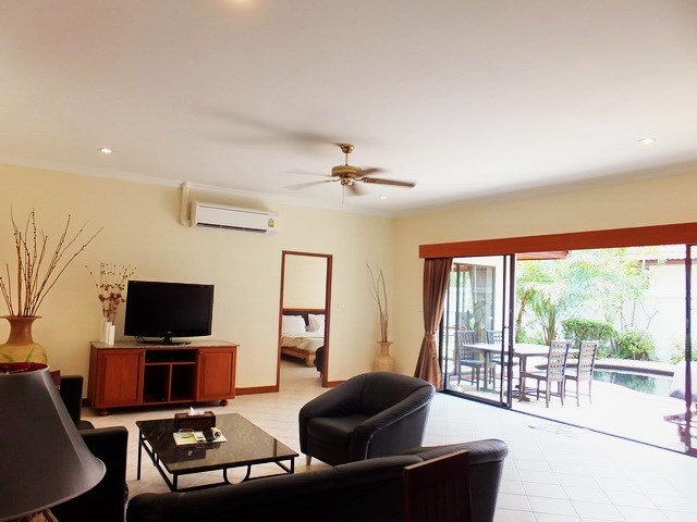 House for sale View Talay Villas Jomtien showing the living area and pool view 