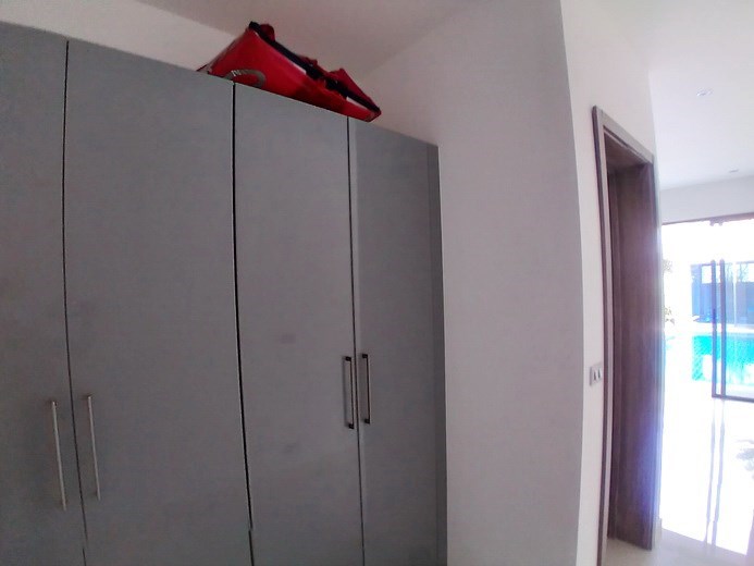 House for sale Mabprachan Pattaya showing the second bedroom with built-in wardrobes House for sale Mabprachan Pattaya showing the second bedroom with built-in wardrobes