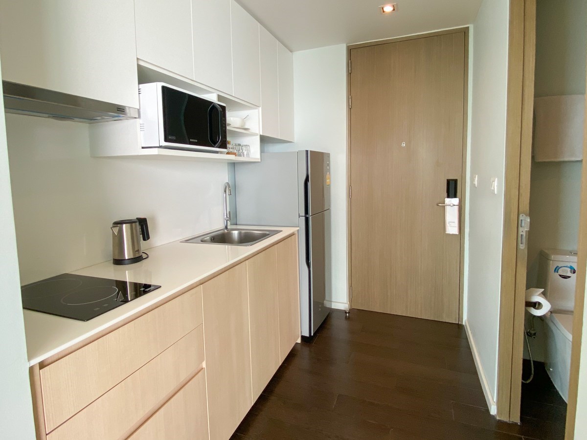 Condo for sale Na Jomtien Pattaya showing the Kitchen and Entrance Condo for sale Na Jomtien Pattaya showing the Kitchen and Entrance