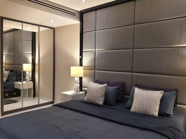 Condominium for rent on Pratumnak Hill showing the bedroom with built-in wardrobes 