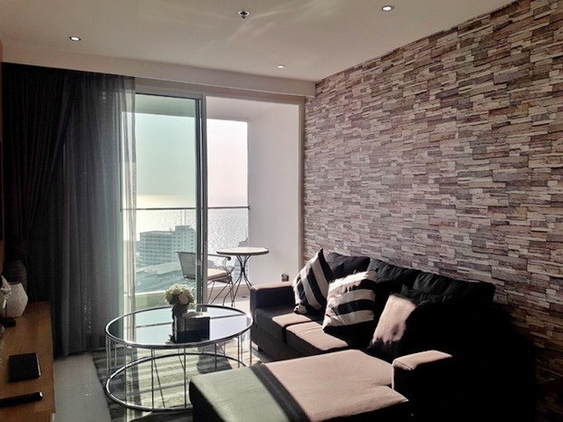 Condominium for rent on Pratumnak Hill showing the living area and balcony Condominium for rent on Pratumnak Hill showing the living area and balcony