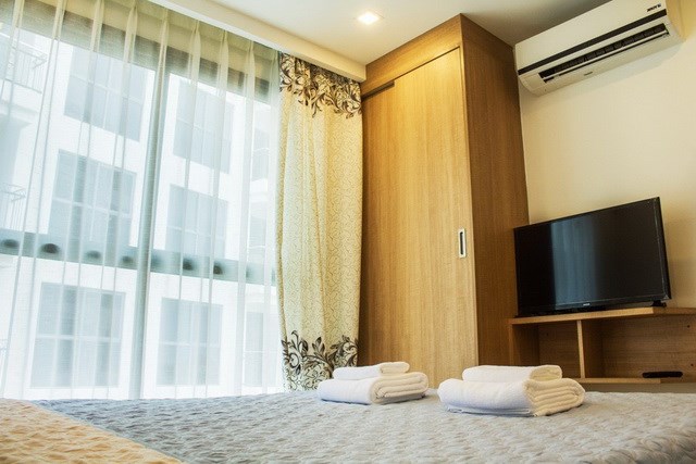Condominium for sale Pratumnak Hill Pattaya showing the bedroom and builtin wardrobe 