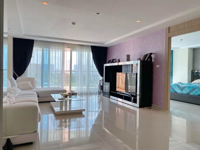 Condominium for sale Pratumnak Pattaya showing the living room and balcony Condominium for sale Pratumnak Pattaya showing the living room and balcony
