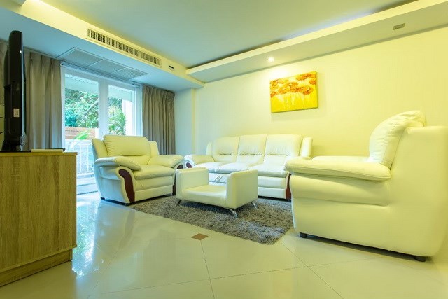 Condominium for sale Pattaya showing the living area and balcony Condominium for sale Pattaya showing the living area and balcony