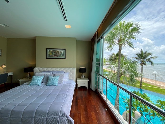 Condominium for Sale Naklua Ananya showing the master bedroom and pool view 