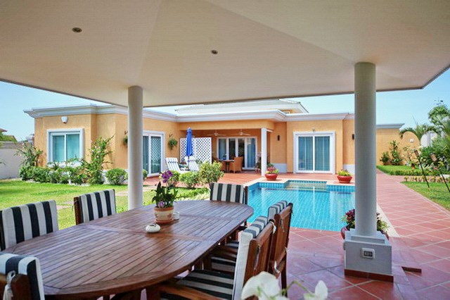 House for sale Siam Royal View Pattaya showing the sala pool and garden