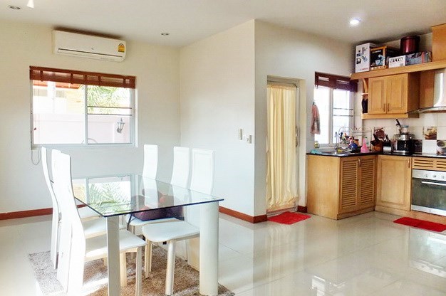 House for Sale Mabprachan Pattaya showing the dining and kitchen areas
